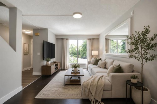 36 Falton Court Ne, Calgary, AB - Indoor Photo Showing Living Room