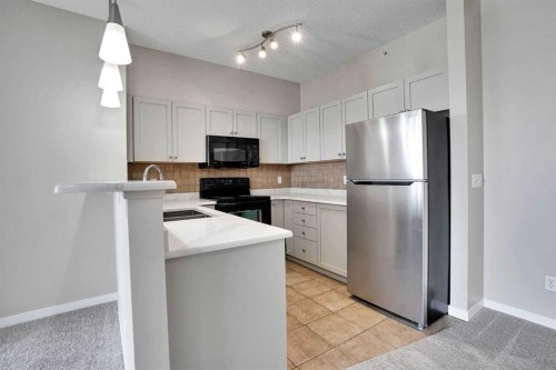 2415-1140 Taradale Drive Ne, Calgary, AB - Indoor Photo Showing Kitchen