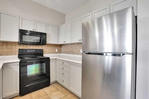 2415-1140 Taradale Drive Ne, Calgary, AB - Indoor Photo Showing Kitchen
