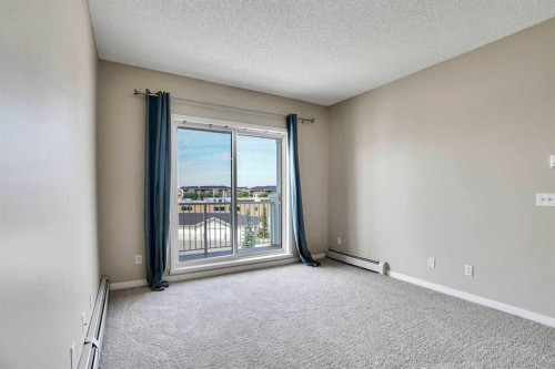 2415-1140 Taradale Drive Ne, Calgary, AB - Indoor Photo Showing Other Room