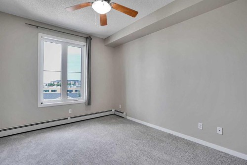 2415-1140 Taradale Drive Ne, Calgary, AB - Indoor Photo Showing Other Room