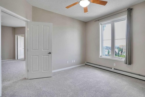 2415-1140 Taradale Drive Ne, Calgary, AB - Indoor Photo Showing Other Room