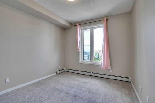 2415-1140 Taradale Drive Ne, Calgary, AB - Indoor Photo Showing Other Room