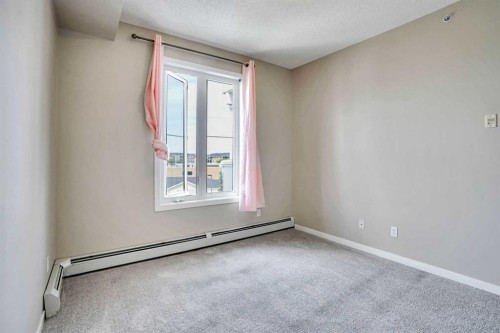 2415-1140 Taradale Drive Ne, Calgary, AB - Indoor Photo Showing Other Room