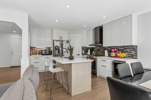 60 Cranfield Park Se, Calgary, AB - Indoor Photo Showing Kitchen With Upgraded Kitchen
