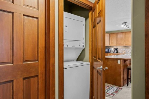 215-150 Crossbow Place, Canmore, AB - Indoor Photo Showing Laundry Room