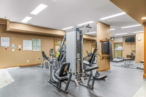 215-150 Crossbow Place, Canmore, AB - Indoor Photo Showing Gym Room