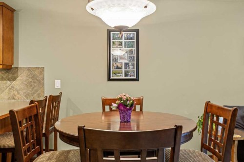 215-150 Crossbow Place, Canmore, AB - Indoor Photo Showing Dining Room
