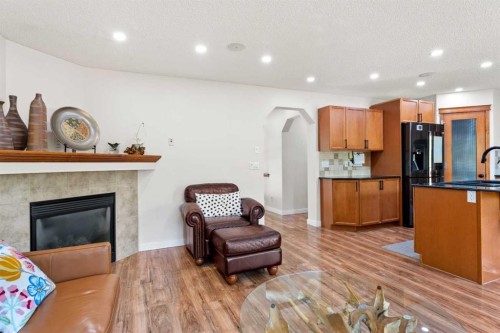 114 Chapalina Terrace Se, Calgary, AB - Indoor Photo Showing Other Room With Fireplace
