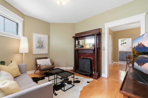 1801 2 Street Nw, Calgary, AB - Indoor Photo Showing Living Room With Fireplace