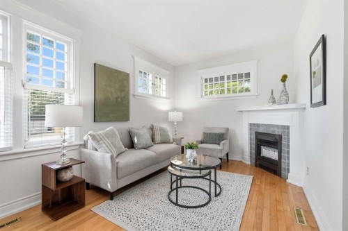 1801 2 Street Nw, Calgary, AB - Indoor Photo Showing Living Room With Fireplace