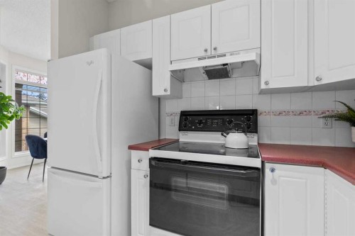 139 Hidden Valley Green Nw, Calgary, AB - Indoor Photo Showing Kitchen