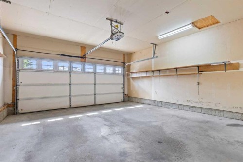 139 Hidden Valley Green Nw, Calgary, AB - Indoor Photo Showing Garage