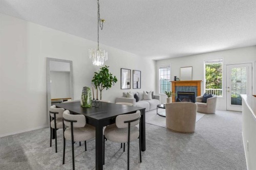139 Hidden Valley Green Nw, Calgary, AB - Indoor With Fireplace