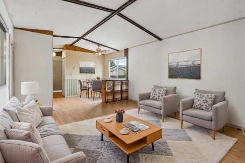 165 Spring Dale Circle Se, Airdrie, AB - Indoor Photo Showing Living Room