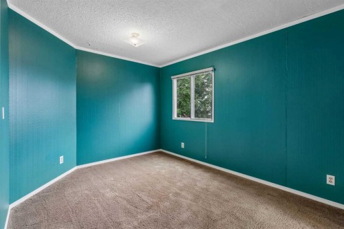 165 Spring Dale Circle Se, Airdrie, AB - Indoor Photo Showing Other Room