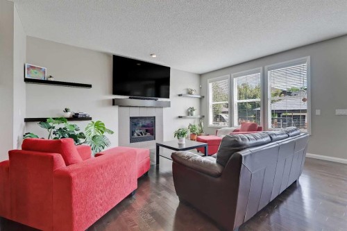 191 Chaparral Valley Terrace Se, Calgary, AB - Indoor Photo Showing Living Room With Fireplace