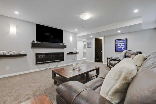191 Chaparral Valley Terrace Se, Calgary, AB - Indoor Photo Showing Other Room With Fireplace