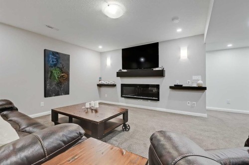 191 Chaparral Valley Terrace Se, Calgary, AB - Indoor Photo Showing Living Room With Fireplace