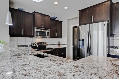 191 Chaparral Valley Terrace Se, Calgary, AB - Indoor Photo Showing Kitchen With Stainless Steel Kitchen With Double Sink With Upgraded Kitchen