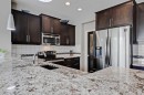 191 Chaparral Valley Terrace Se, Calgary, AB  - Indoor Photo Showing Kitchen With Stainless Steel Kitchen With Double Sink With Upgraded Kitchen 