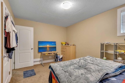9 Saddlelake Grove Ne, Calgary, AB - Indoor Photo Showing Bedroom