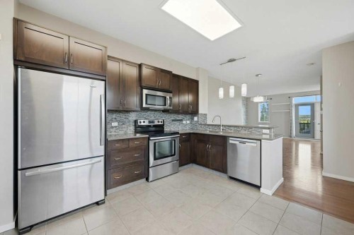 3 Evansview Gardens Nw, Calgary, AB - Indoor Photo Showing Kitchen With Stainless Steel Kitchen With Upgraded Kitchen
