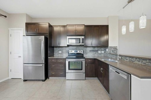 3 Evansview Gardens Nw, Calgary, AB - Indoor Photo Showing Kitchen With Stainless Steel Kitchen