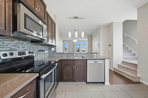 3 Evansview Gardens Nw, Calgary, AB - Indoor Photo Showing Kitchen With Stainless Steel Kitchen With Upgraded Kitchen