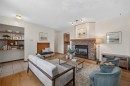 4639 Marbank Drive, Calgary, AB  - Indoor Photo Showing Living Room With Fireplace 