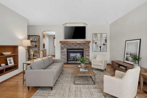 4639 Marbank Drive, Calgary, AB - Indoor Photo Showing Living Room With Fireplace