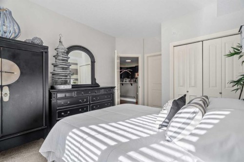 3106-15 Sunset Square, Cochrane, AB - Indoor Photo Showing Bedroom