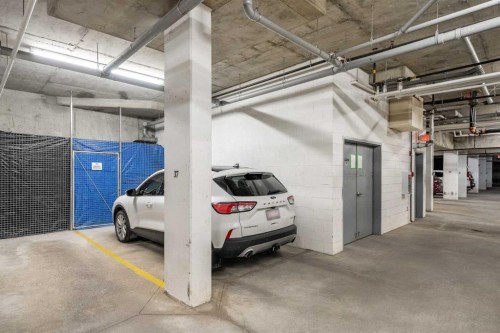 3106-15 Sunset Square, Cochrane, AB - Indoor Photo Showing Garage