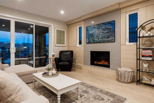 84 Timberline Way Sw, Calgary, AB - Indoor Photo Showing Living Room With Fireplace