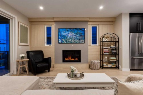 84 Timberline Way Sw, Calgary, AB - Indoor Photo Showing Living Room With Fireplace