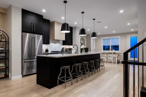 84 Timberline Way Sw, Calgary, AB - Indoor Photo Showing Kitchen With Upgraded Kitchen