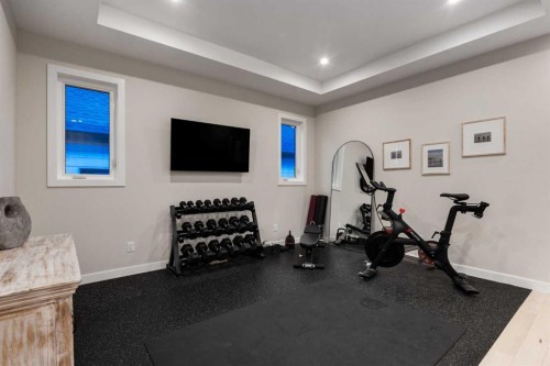 84 Timberline Way Sw, Calgary, AB - Indoor Photo Showing Gym Room