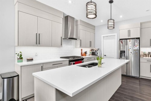 86 Carringvue Manor Nw, Calgary, AB - Indoor Photo Showing Kitchen With Double Sink With Upgraded Kitchen