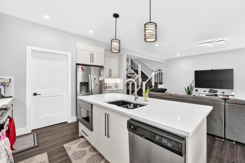 86 Carringvue Manor Nw, Calgary, AB - Indoor Photo Showing Kitchen With Double Sink