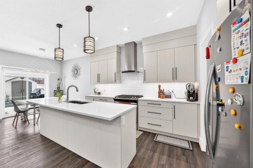 86 Carringvue Manor Nw, Calgary, AB - Indoor Photo Showing Kitchen With Double Sink With Upgraded Kitchen