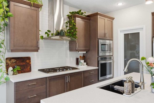 26 Evansfield Park Nw, Calgary, AB - Indoor Photo Showing Kitchen With Upgraded Kitchen