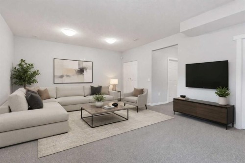 26 Evansfield Park Nw, Calgary, AB - Indoor Photo Showing Living Room