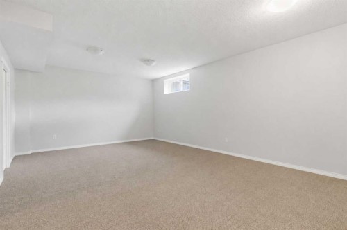 26 Evansfield Park Nw, Calgary, AB - Indoor Photo Showing Other Room