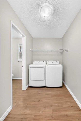 247 Covington Close Ne, Calgary, AB - Indoor Photo Showing Laundry Room