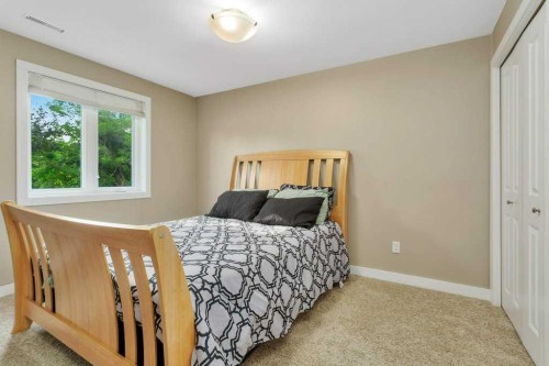 3565 54 Avenue, Innisfail, AB - Indoor Photo Showing Bedroom