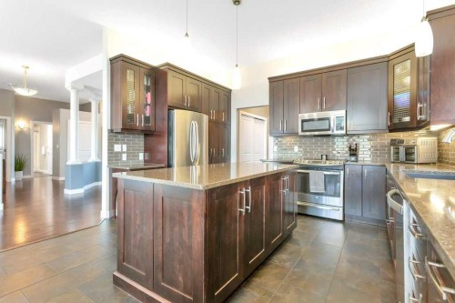 3565 54 Avenue, Innisfail, AB - Indoor Photo Showing Kitchen With Stainless Steel Kitchen With Upgraded Kitchen