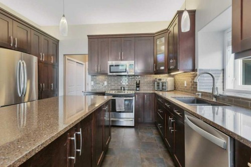 3565 54 Avenue, Innisfail, AB - Indoor Photo Showing Kitchen With Stainless Steel Kitchen With Upgraded Kitchen