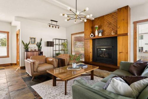 115 Rockmont Court Nw, Calgary, AB - Indoor Photo Showing Living Room With Fireplace