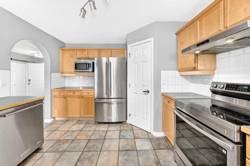 23 Thornbird Way Se, Airdrie, AB - Indoor Photo Showing Kitchen With Stainless Steel Kitchen
