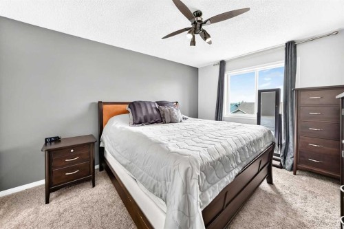 23 Thornbird Way Se, Airdrie, AB - Indoor Photo Showing Bedroom